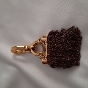 Juicy Couture charm.